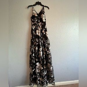 Formal dress size zero. Bought at Bloomingdale’s never worn tags on.